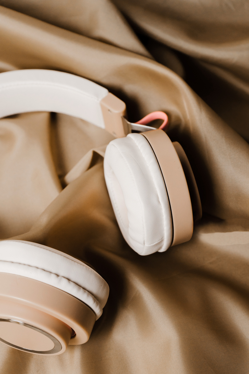 Wireless Headphones on Brown Silk Fabric